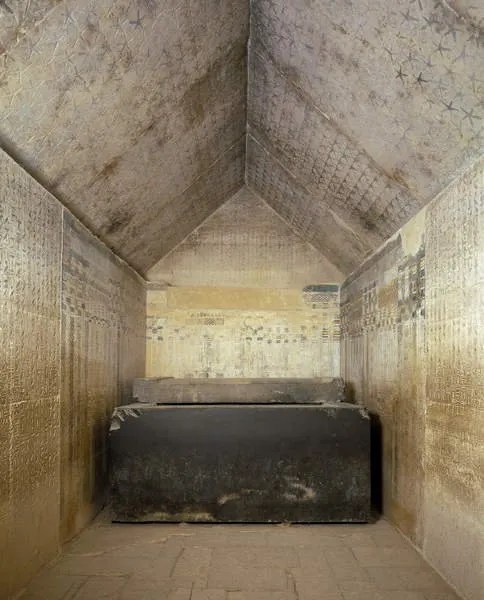 Inside the burial chamber with basalt sarcophagus in the pyramid of Una.